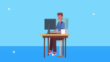 Ofiste çalışan adam masaüstünde çalışıyor.