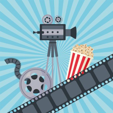 Kamera ve patlamış mısırlı film makarası.