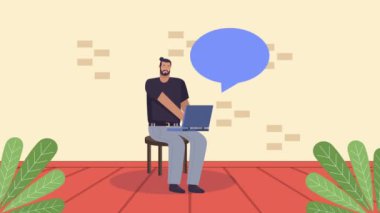 Sandalyeye oturmuş dizüstü bilgisayar kullanan iş adamı