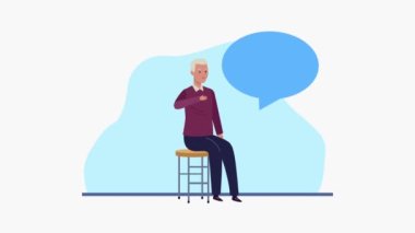 Yaşlı adam sandalyede oturmuş konuşuyor.