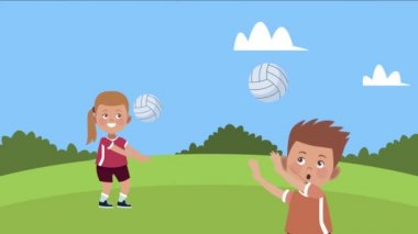 Voleybol oynayan iki çocuk.