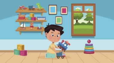 Küçük çocuk tren ve oyuncaklarla oynuyor.