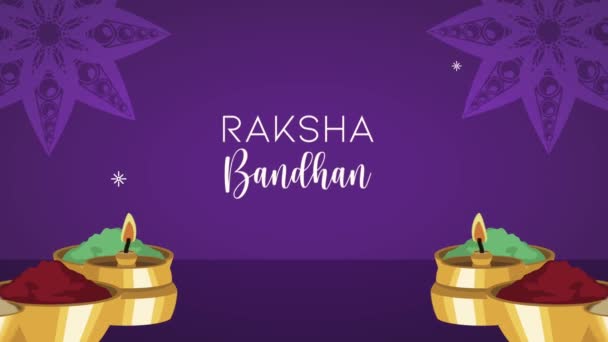 Raksha bandhan slavnost nápis s práškovými barvami a svíčky — Stock video