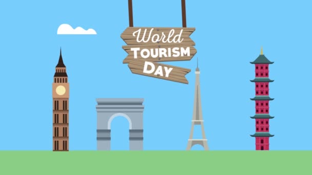 Dia mundial do turismo lettering em rótulo de madeira e marcos — Vídeo de Stock