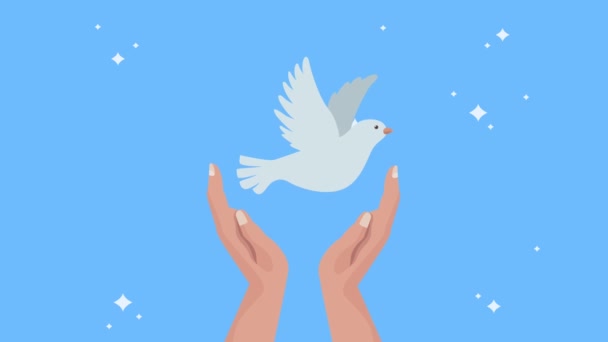 International peace day animation with hands lifting dove flying — Stock Video