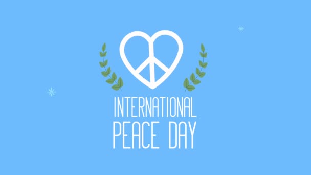 International peace day lettering with heart and wreath — Stock Video