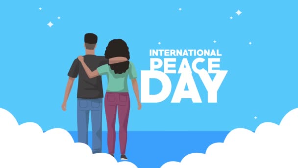 Dia internacional da paz lettering com amantes casal — Vídeo de Stock
