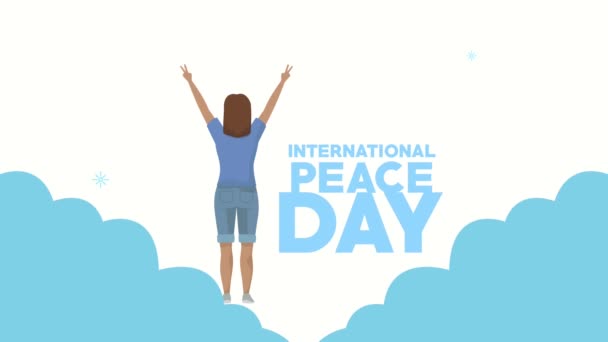Internationale vredesdag belettering met vrouw vieren — Stockvideo