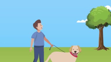 Golden Retriever 'ın sahibi parkta yürüyor.