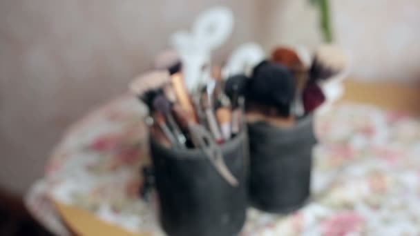 Brush and eye shadow makeup tools — Stock Video