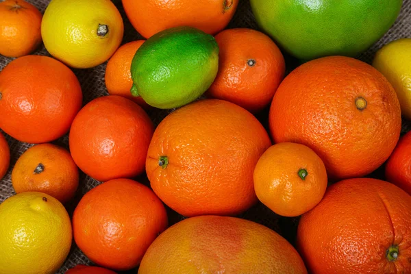 Mound citrus on sacking macro — Stock Photo, Image