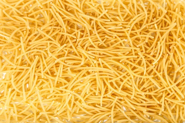 Pasta on a white background close-up macro isolated — Stock Photo, Image