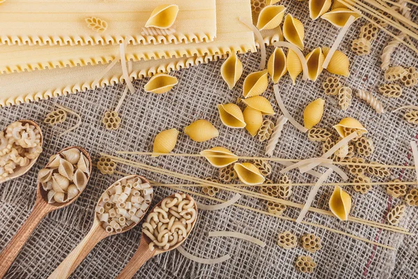 Pasta on sacking close-up macro — Stock Photo, Image