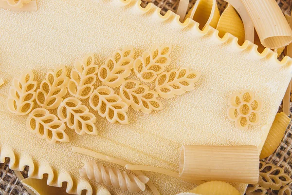 Pasta on sacking close-up macro — Stock Photo, Image