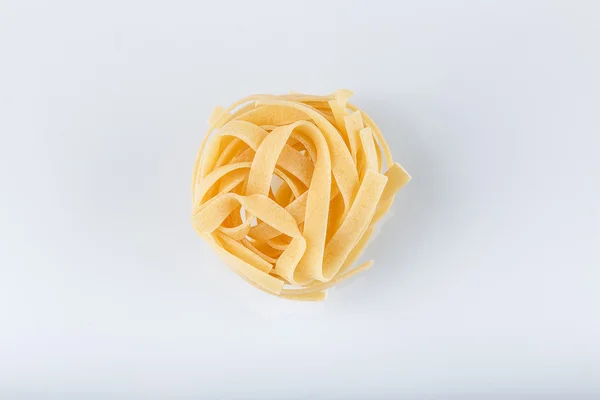 Pasta on a white background close-up macro isolated — Stock Photo, Image