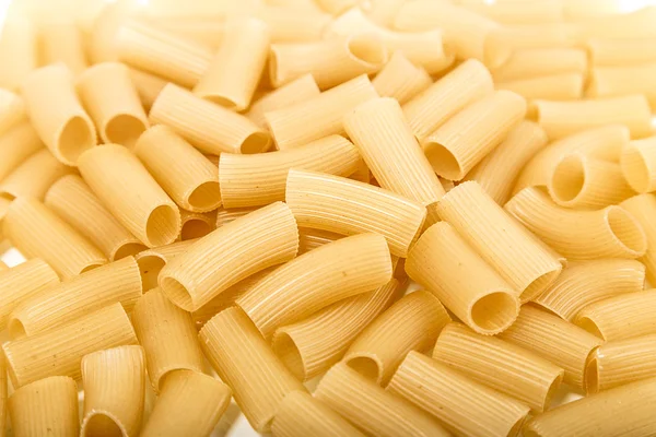 Pasta auf weißem Hintergrund Nahaufnahme Makro isoliert lizenzfreie Stockbilder