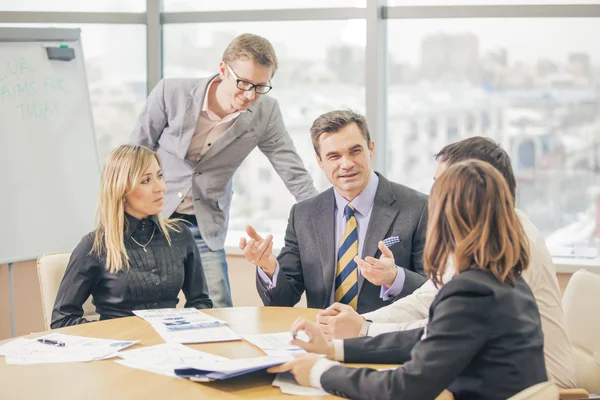 Five businesspeople interacting at meeting — Stock Photo, Image