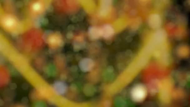 概要金粒子を輝く運動背景 ボケでキラキラ光る記事をつぶやく 新年とクリスマスの背景 シームレス4Kループビデオアニメーション — ストック動画