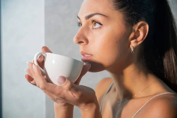 Beautiful Woman Drinking Coffee Close-up