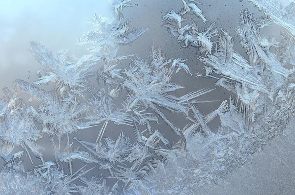 Patrones de hielo en vidrio de invierno — Foto de Stock