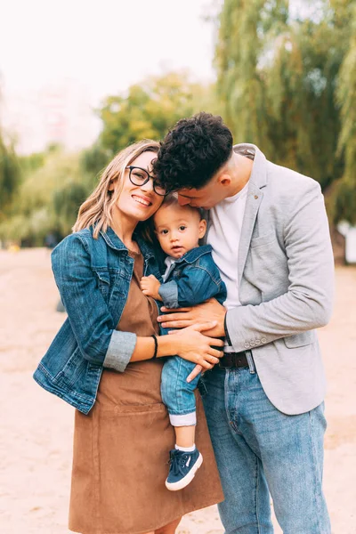 A portrait of a young little family having a great time together — Stock Photo, Image