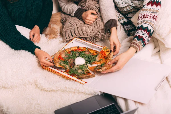 Girls party with pizza, girlfriends having beautiful time eating pizza and looking at movie — Stock Photo, Image