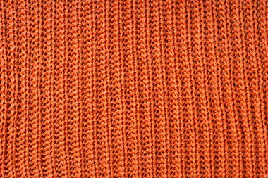 Turuncu yün kumaş dokusunun yakın fotoğrafını çek