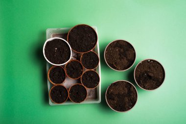 Top view photo of empty  flower vase with ground.