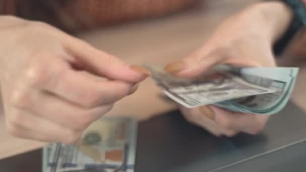 Close up footage of woman counting dollars in office — Stock Video