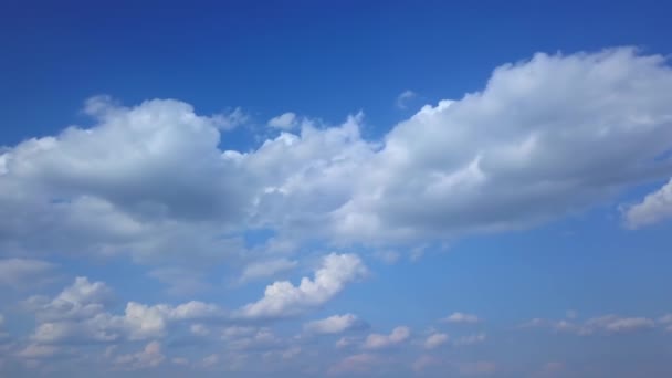 Aerial drone footage panning of beautiful clouds on blue sky — Stock Video
