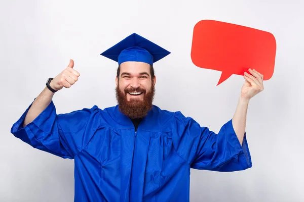 Excited Bearded Man Blue Robe Holding Speech Bubble Showing Thumb — Stock Photo, Image