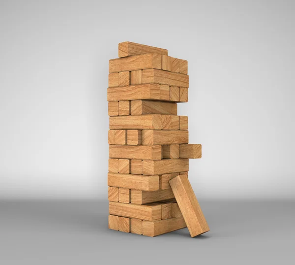 Una torre de bloques de madera sobre fondo blanco —  Fotos de Stock