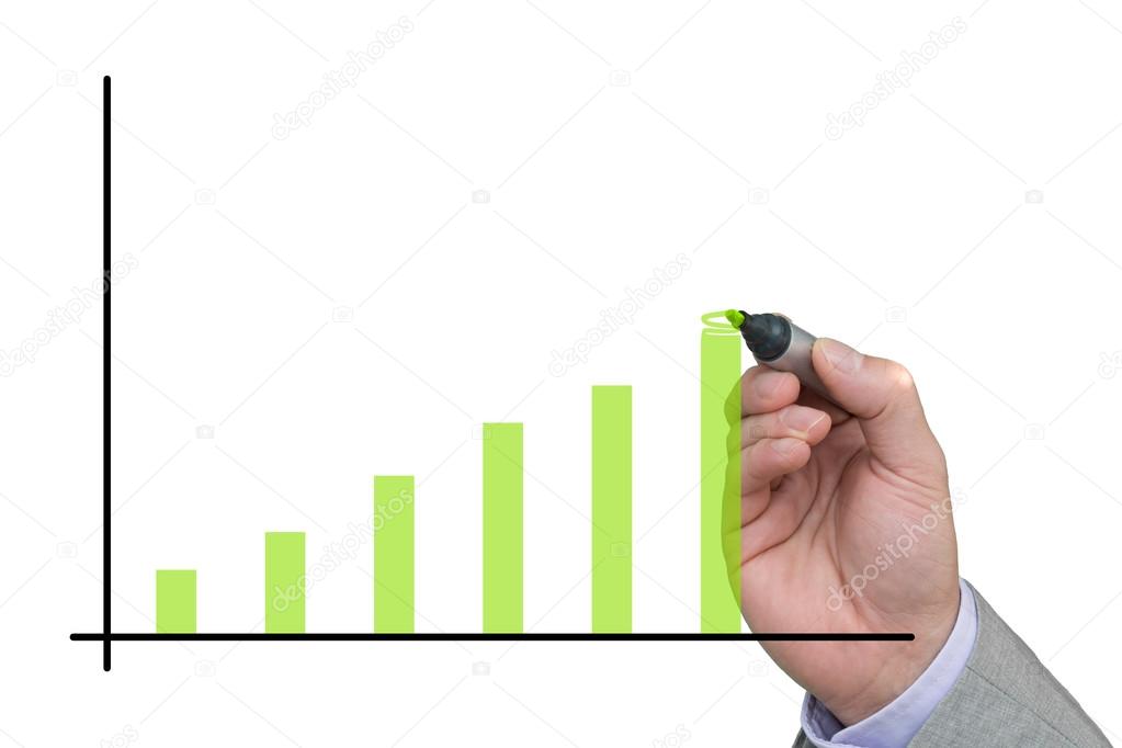 Businessman drawing a rising bar chart