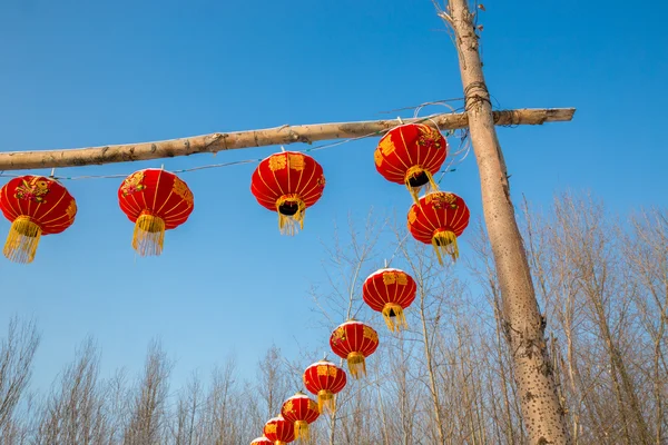 Rij van chinese lantaarns op een stapel Rechtenvrije Stockfoto's
