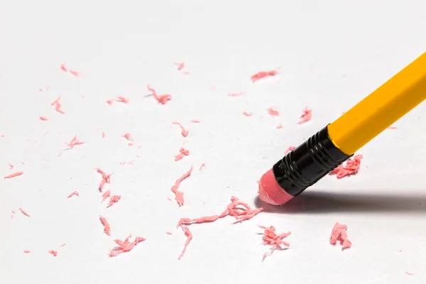 Pencil erasing on paper — Stock Photo, Image