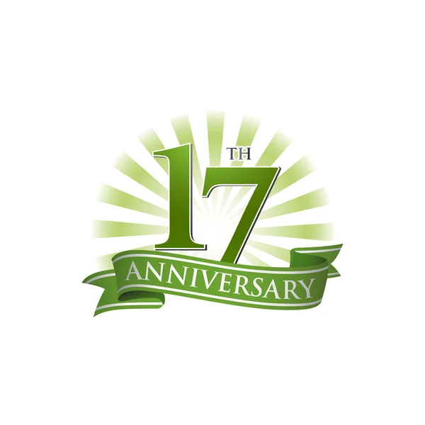 Logo du ruban du 17e anniversaire avec des rayons de lumière verts — Image vectorielle