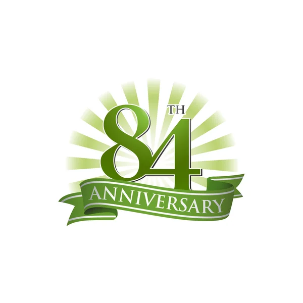 Logo de la cinta del 84º aniversario con rayos verdes de luz — Archivo Imágenes Vectoriales