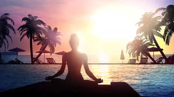 Günbatımı arka planında meditasyon yapan bir kızın silueti.. — Stok fotoğraf