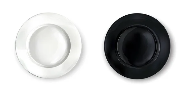 Two empty round plates - white and black. — Stock Photo, Image