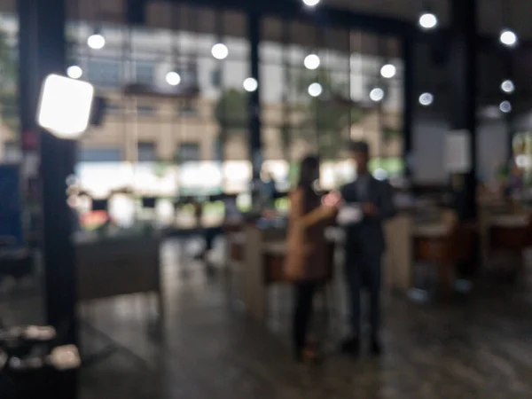 abstract blur background of video camera and people interview in meeting room