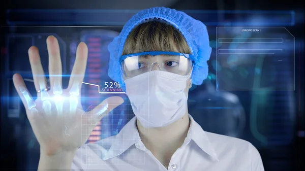 Female octor with futuristic hud screen tablet.Human body scan. Medical concept of the future — 스톡 사진