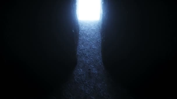 A lonely man stands in front of a moving light portal. — Stock Video