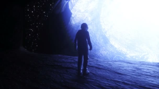 Seul astronaute dans une grotte spatiale. Vue sur l'espace. Animation réaliste 4k. — Video