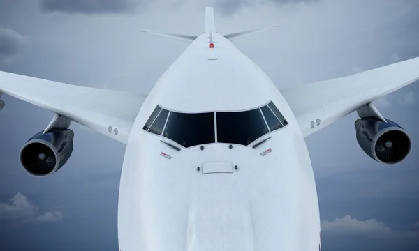 White plane flying in sky and clouds. Airplane boeing 747 — Stock Photo, Image