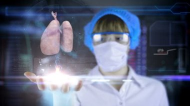 Doktor fütüristik hud ekran tablet ile. akciğer, bronşlar. Geleceğin sağlık kavramı