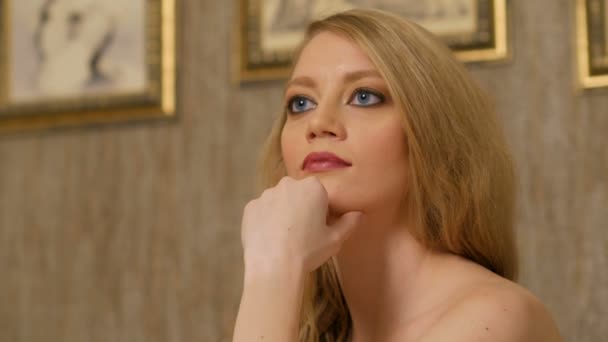 Luxury Blonde With Long Loose Hair And Big Blue Eyes With Vivid