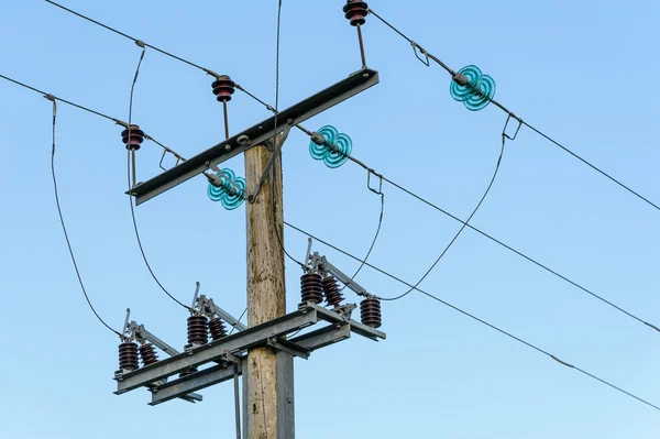 Mains electricity pole — Stock Photo, Image