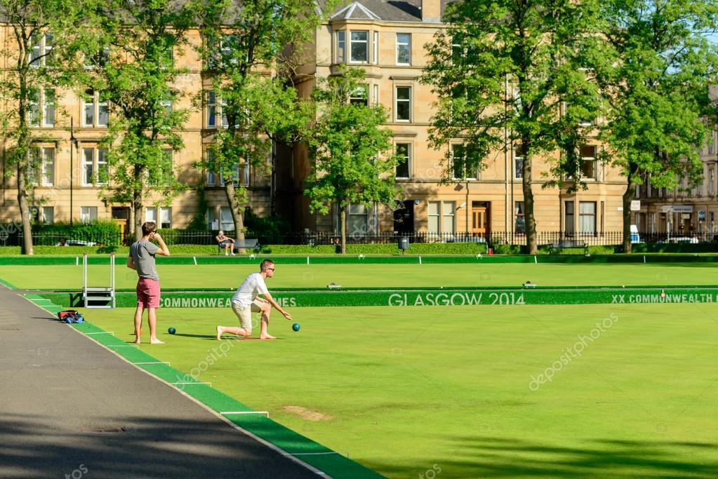 Photos barefoot bowls Man playing barefoot bowls Stock Editorial