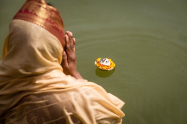 Hindu woman makes and Aarti offering clipart
