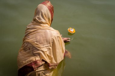 Hindu woman makes and Aarti offering
